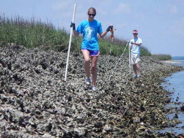 image of students measuring oyster reef