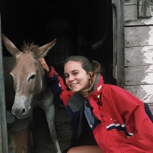 image of Alannah Dodd with donkey